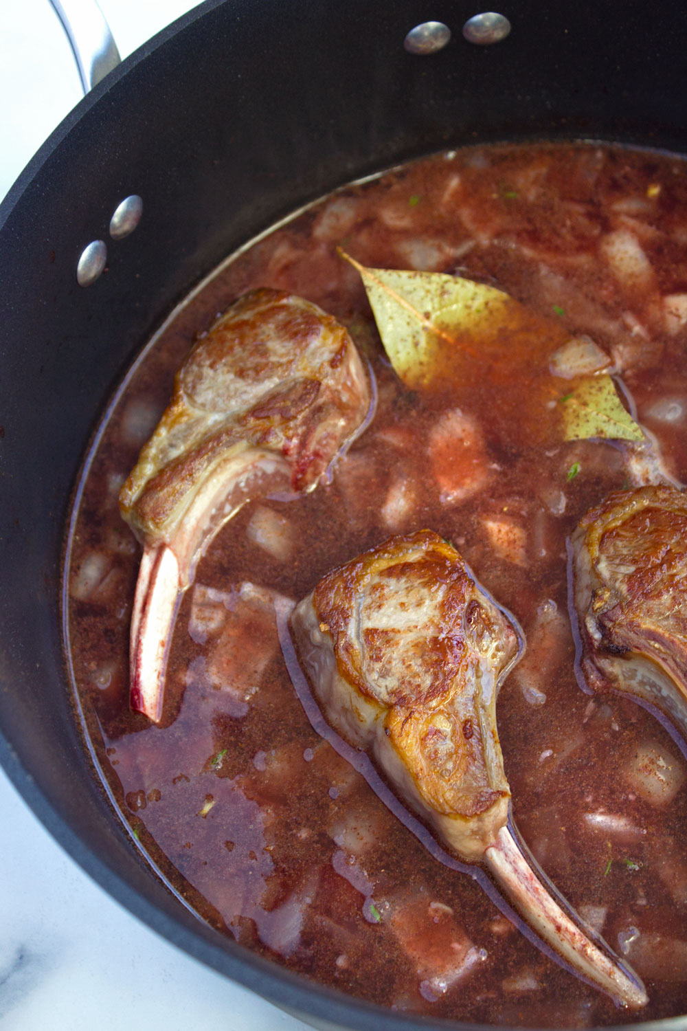 Pomegranate Braised Lamb with Lemony Chickpea Puree